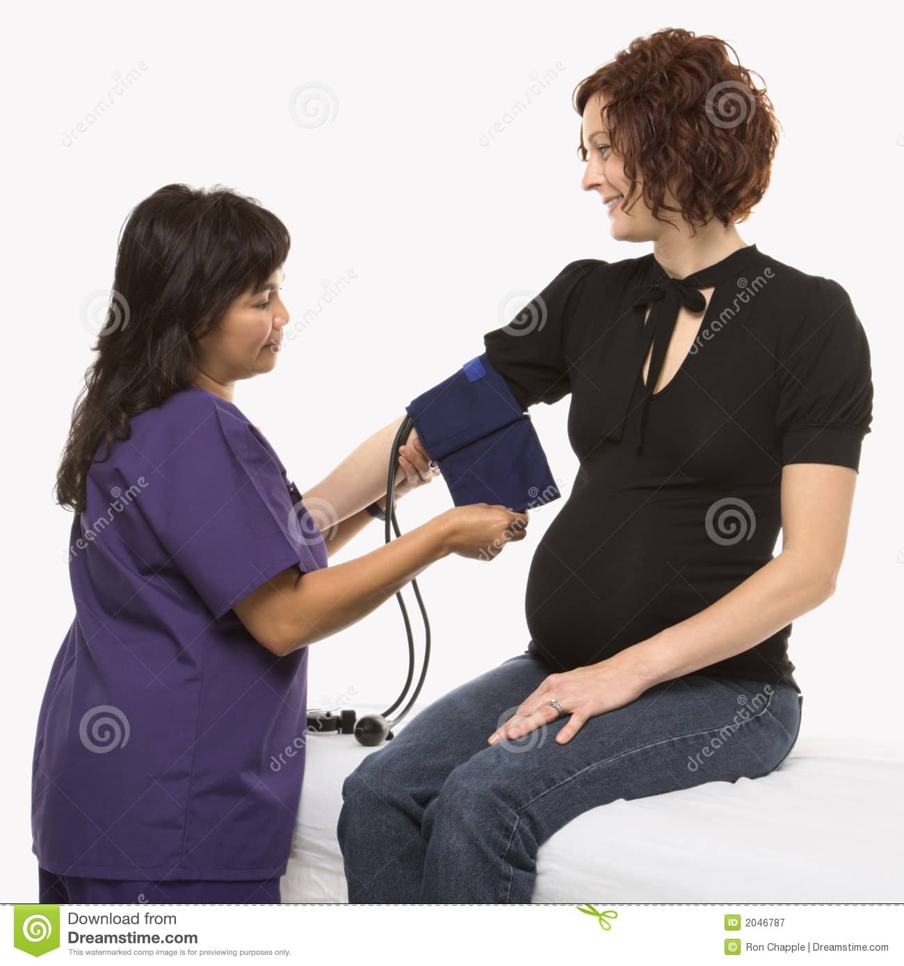 Pregnant Woman Having Blood Pressure Checked. Stock Image